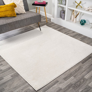 Haze Solid Low-pile Area Rug Cream